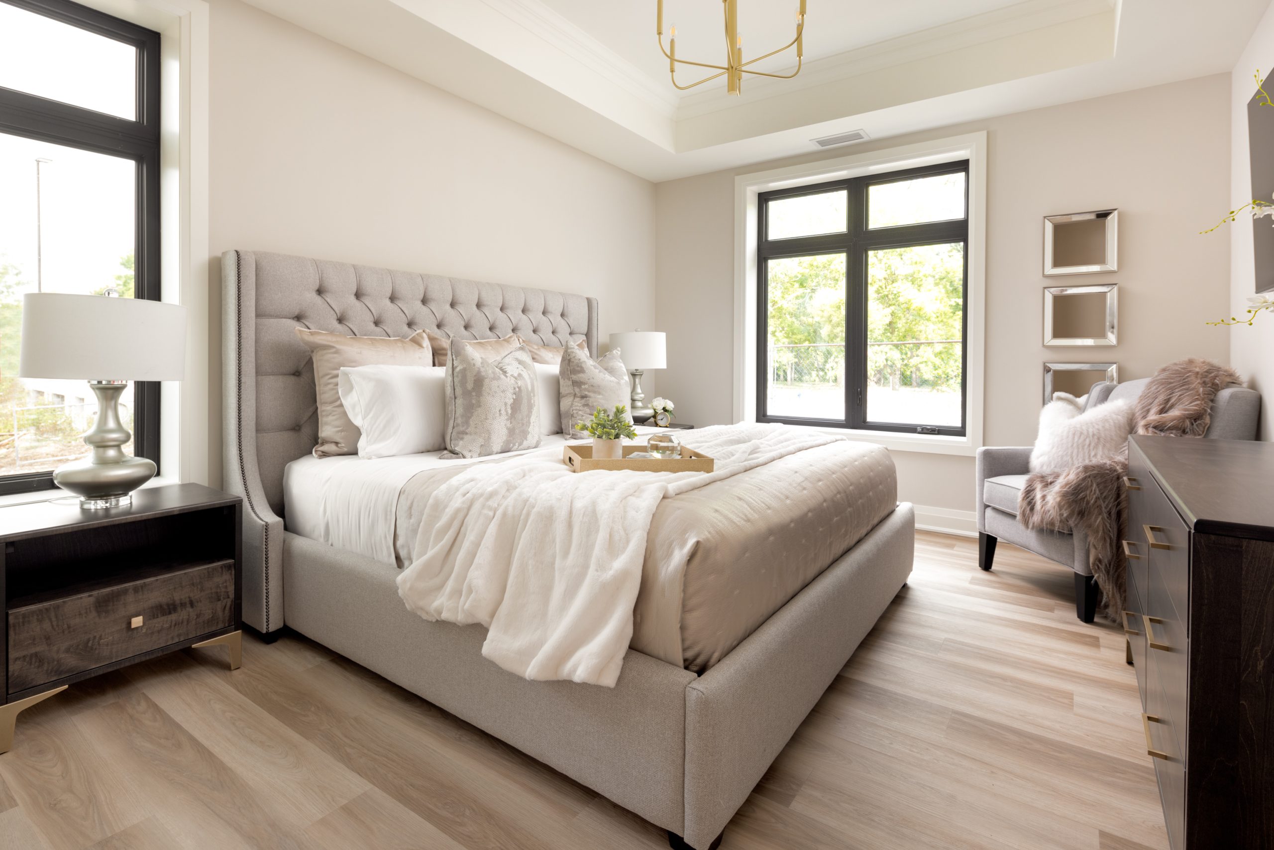 Large master bedroom with modern and contemporary styling.